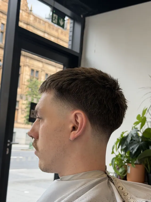 A textured crop with a drop fade, by the window